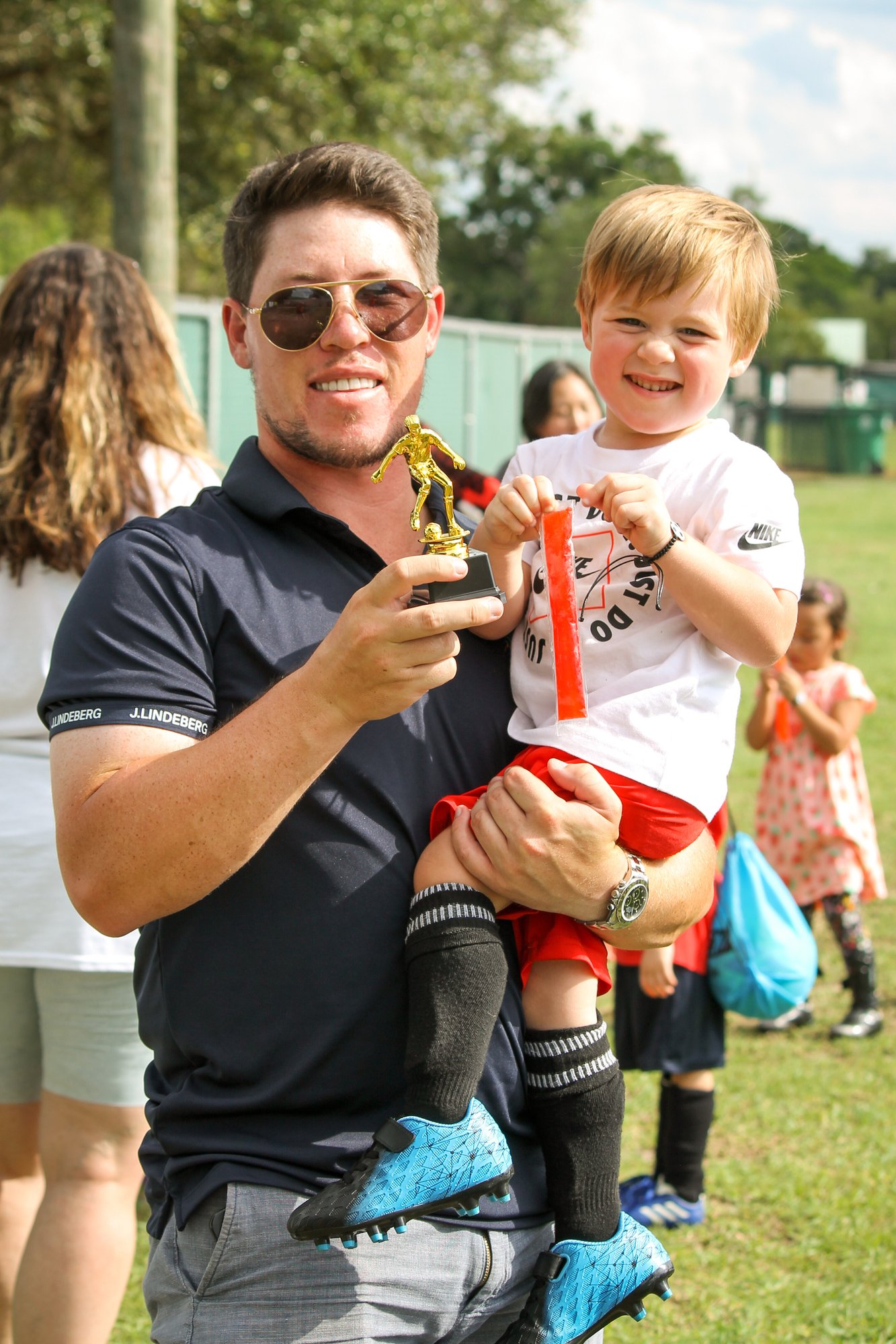 A happy Winter Garden Youth Soccer Academy player and parent!